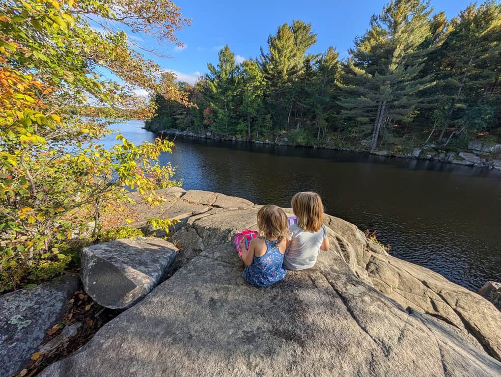 kids-sitting-by-magnetawan-river-ontario.jpg