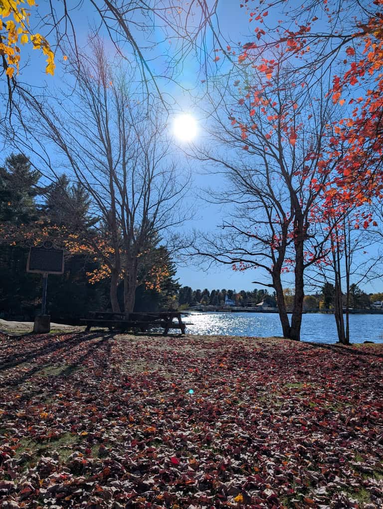 Fall sunset over the Magnetawan River in Ontario, showcasing local real estate scenery and cottage country charm.