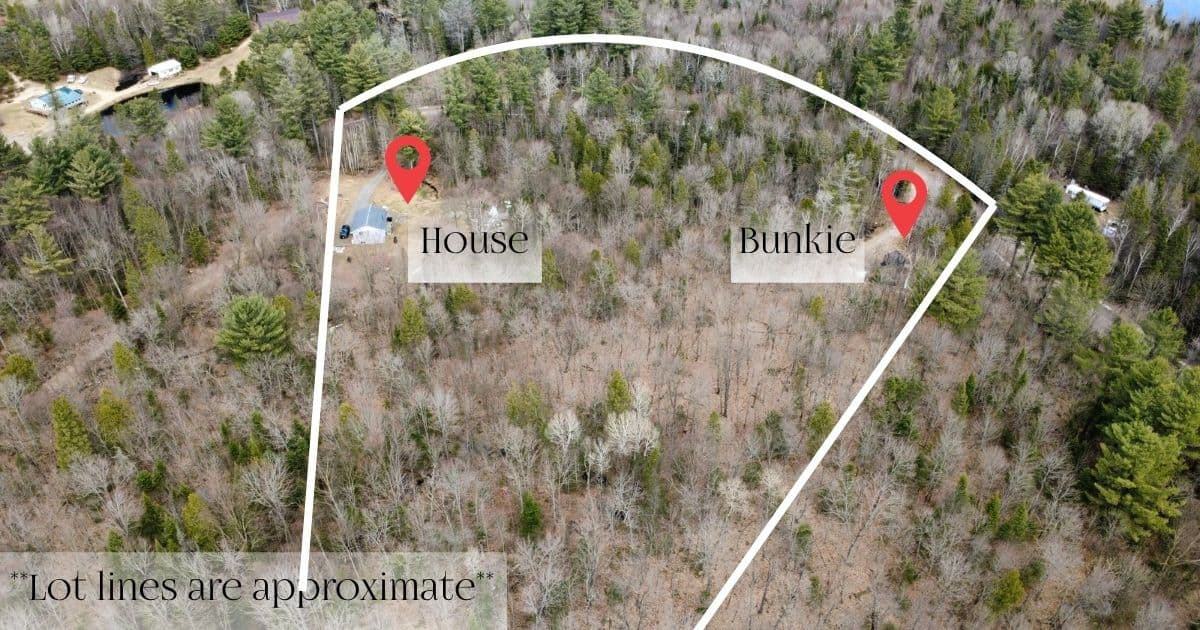 Aerial drone view of house and bunkie at 606 Rye Road Lount Township on 8.5 acres of treed land